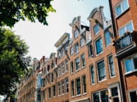 rij huizen gevels woningen